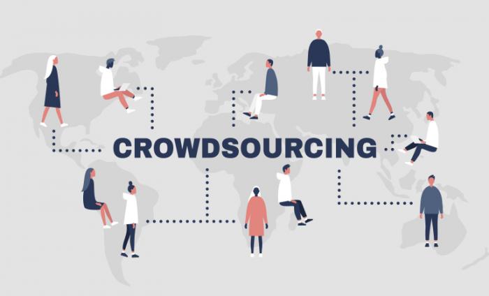 Image of Crowdsourcing on a photo and then animated people coming off of it from lines to show a connection to the word.